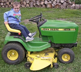 Jayce on tractor mower